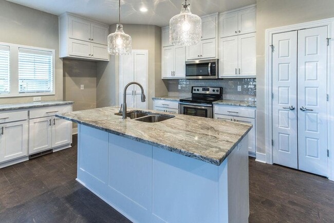 Building Photo - COMING SOON: Modern 3-Bedroom Townhome wit...