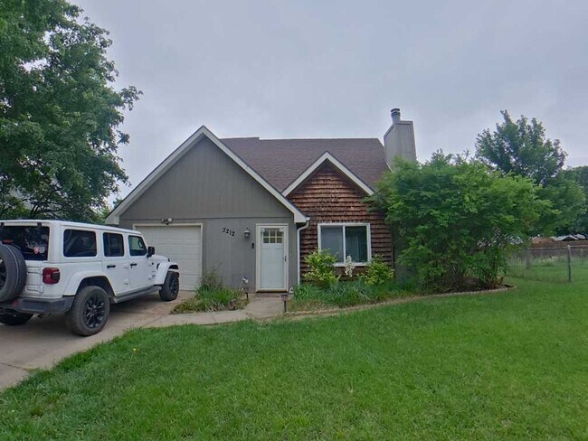 Building Photo - Indoor Balcony + Pet Friendly + Fenced In Yard + Attached Garage + Washer & Dryer Included! Avail...