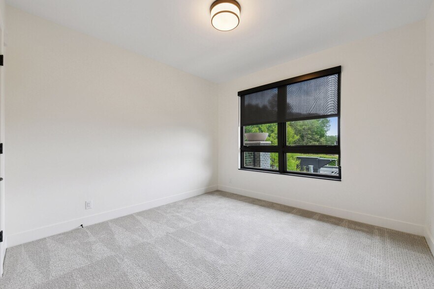 Second bedroom is also filled with natural light - 222 Ferndale Rd S