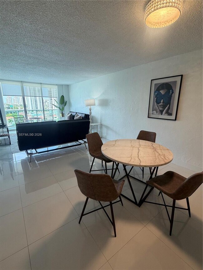 Building Photo - 19390 Collins Ave