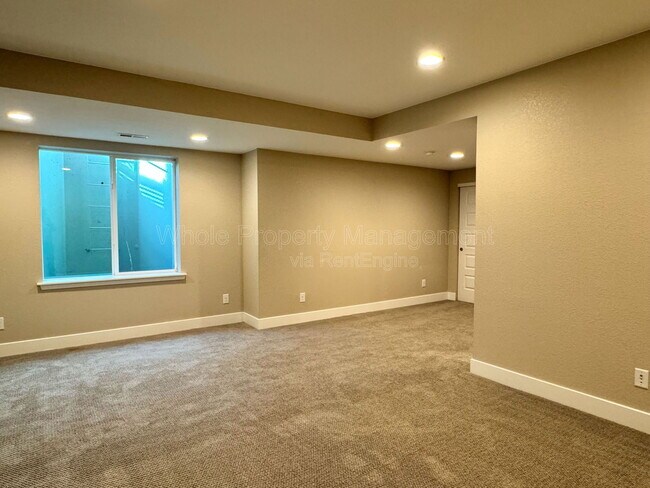 Building Photo - 1451 W 67th Ave