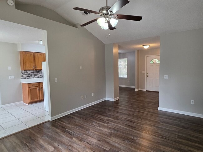 Building Photo - Woodbury Subdivision. 3 bedrooms. 2 baths. Two car garage. Family with vaulted ceiling. Separate ...