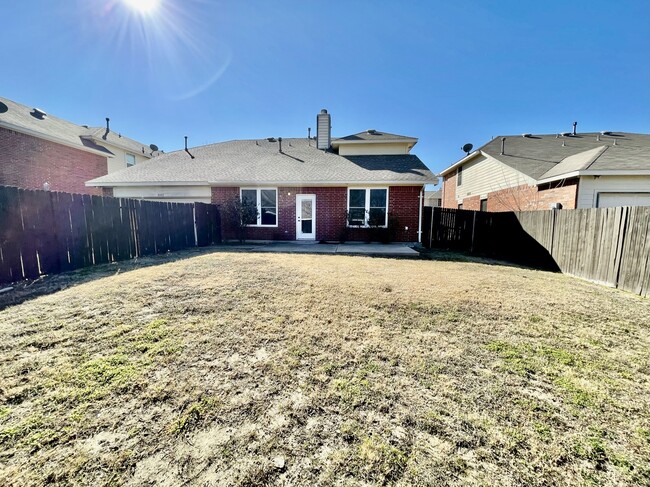 Large fenced backyard. Fence replaced in 2025 (older picture). - 2852 Clear Creek Dr