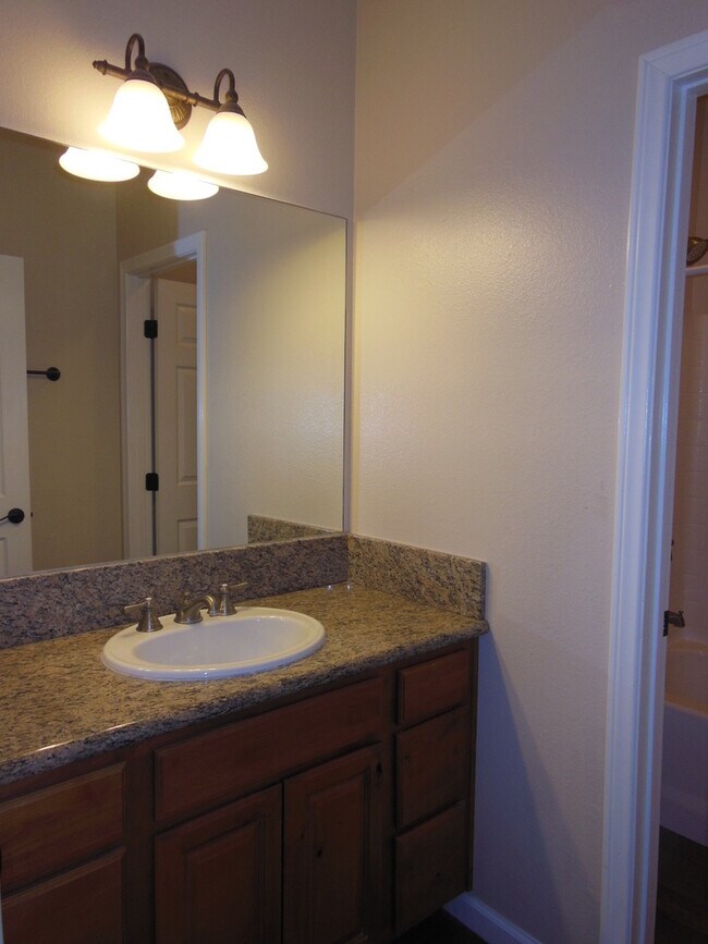 Building Photo - Swamp Cooler, Central AC and Tile Throughout!