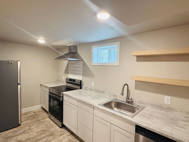 Building Photo - BRAND NEW REMODEL