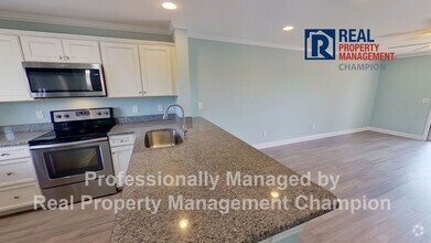 Building Photo - Beautiful Upper Level Condo with Convenien...