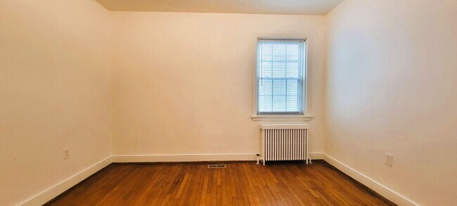 Building Photo - Remodeled brick bungalow with 1st floor li...