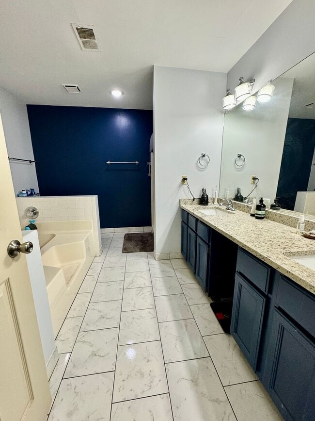 Building Photo - 4 Bedrooms with Finished Basement and Bonu...