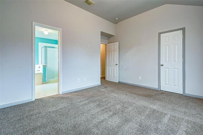 Building Photo - This one-story, three-bedroom, two bath ho...