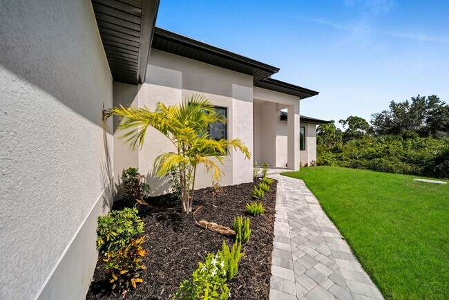 Building Photo - Single family for rent in Port Charlotte. New construction. 3+Den/ 2 bath. City water.