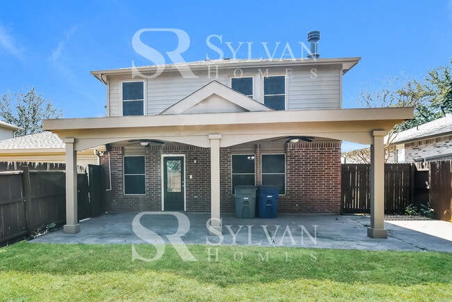 Building Photo - The living is easy in this gorgeous 4BR, 2.5BA brick home