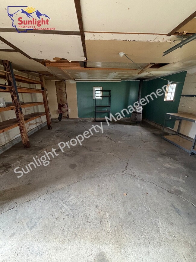 Building Photo - 2 Bed, 1 Bath Home with Detached Garage, Fenced Yard, and Built-In Storage