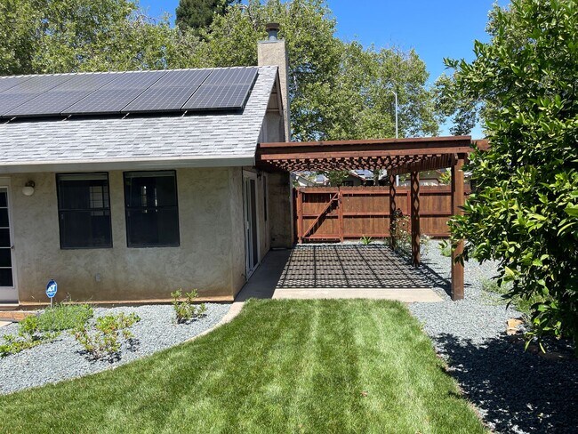 Building Photo - Central Chico, 3/2 fenced yard, 2 car garage, Gardener included, Solar, Fireplace, Craftsman Pergola