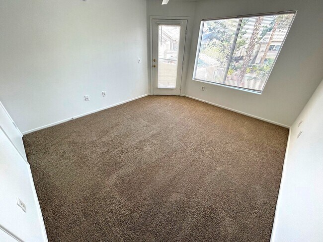 Building Photo - Second-Floor Condo with Private Balcony in Gated Canyon Willows Communit