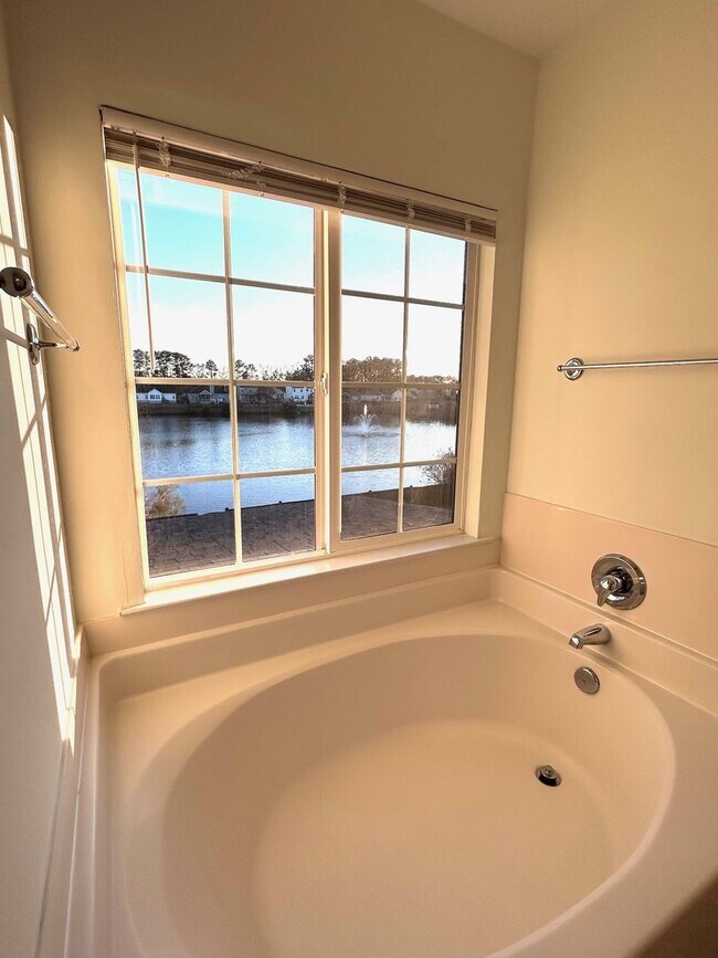 Building Photo - Stunning 4BR Home with amazing pond views!