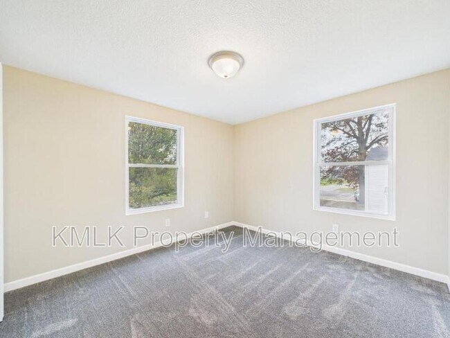 Building Photo - 9042 Maple Grove Rd