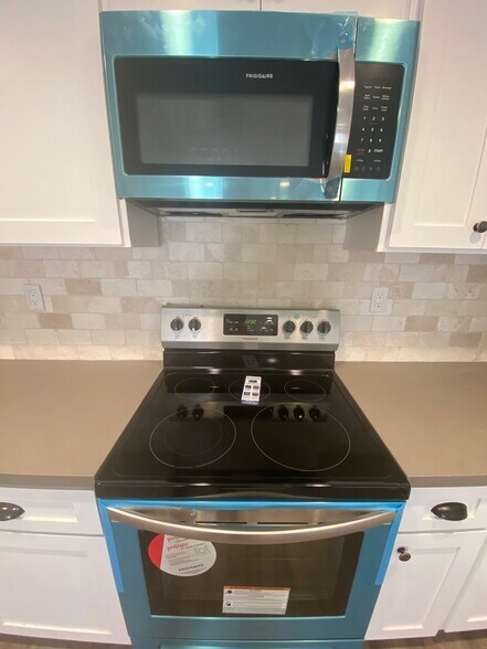 New electric stove - 1784 N 1st Ave