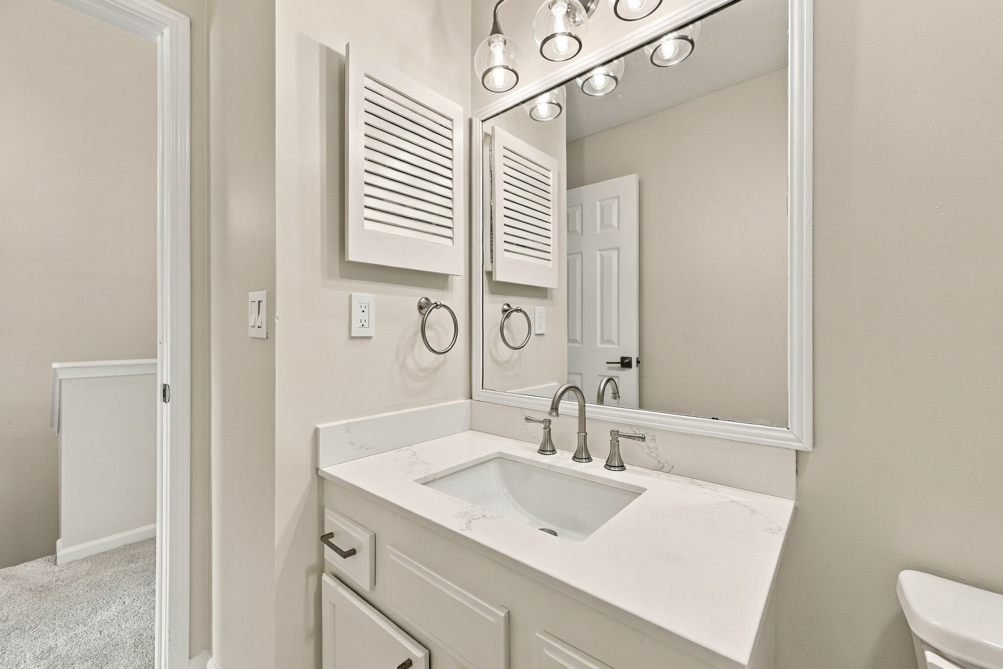 Bright vanity area with plenty of counter space and storage. - 3622 Caroline Vale Blvd