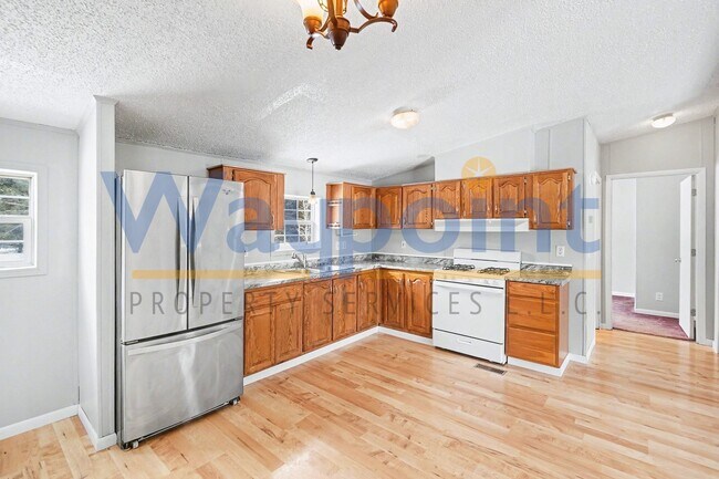 Building Photo - 9127 N Vickeryville Rd