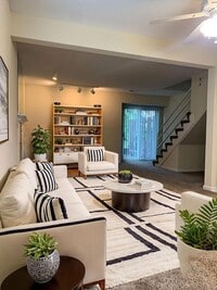 Building Photo - Welcome to Whispering Winds Townhomes – Wh...