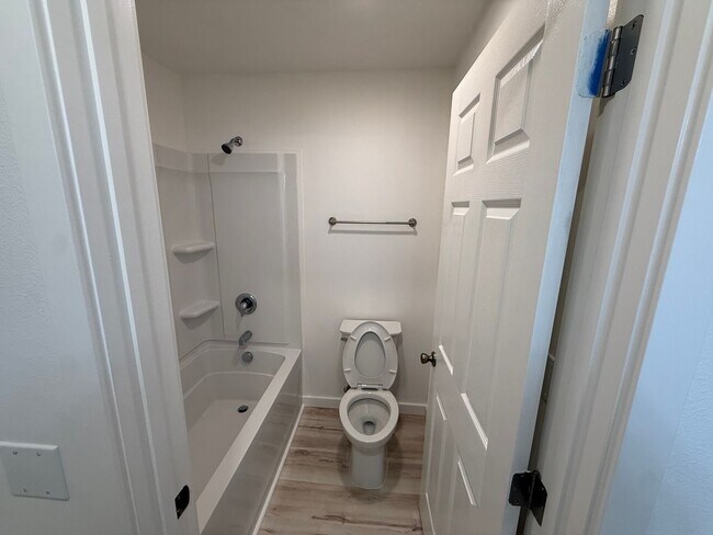 Building Photo - Newly Remodeled | All Utilities Included | AC + Heat | Move-In Ready