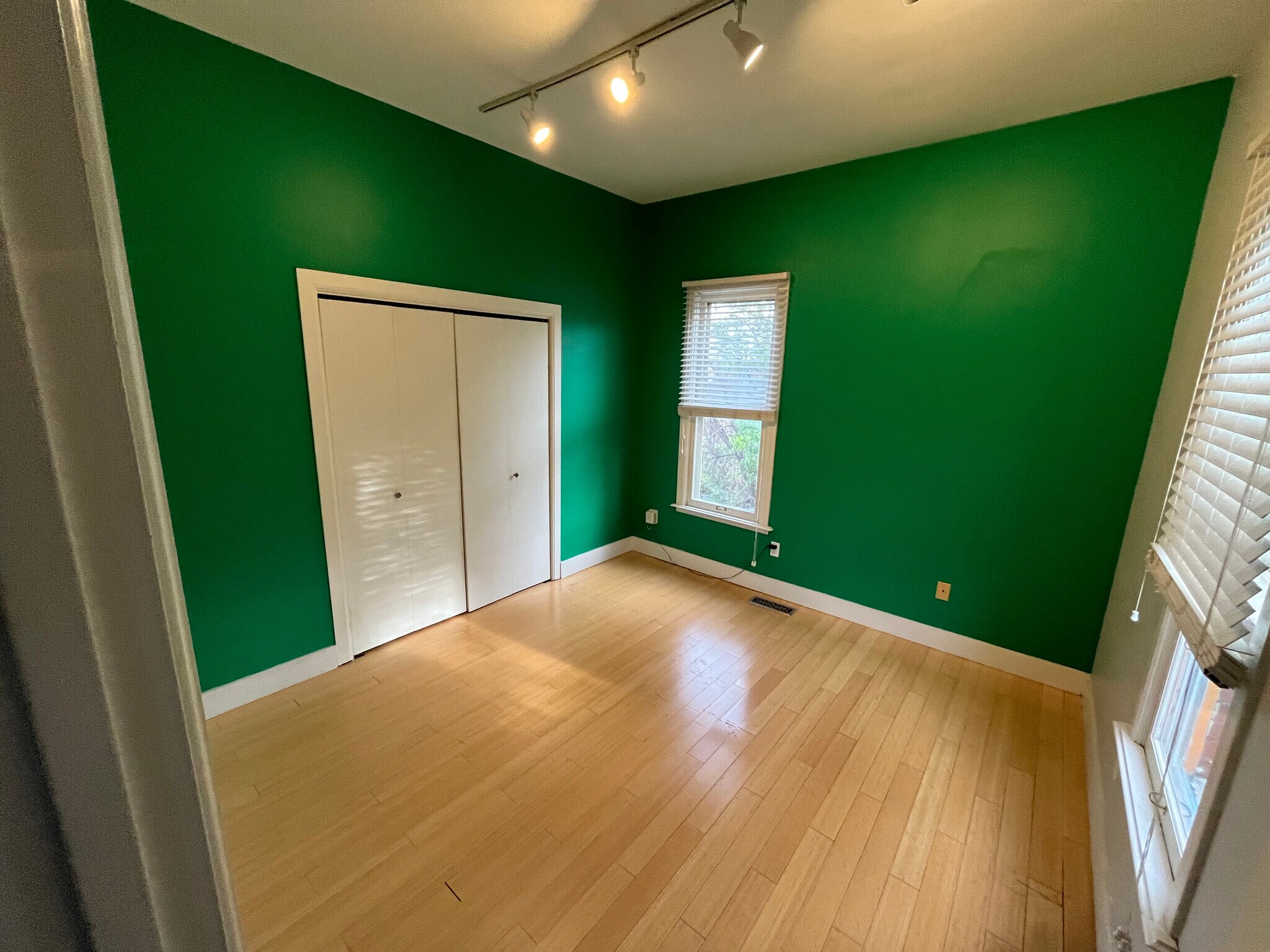 Second bedroom or office with large closet and view of backyard - 1626 Carroll St
