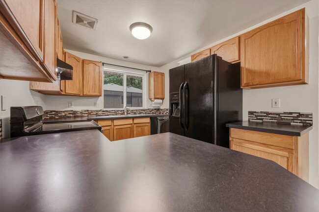 Building Photo - Beautifully Updated 3-Bedroom Rambler with Open Floor Plan & Private Fenced Yard