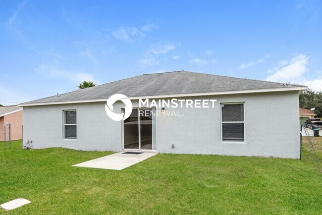 Building Photo - 3 Bedroom Pet-Friendly Home in palm bay, FL with Main Street Renewal