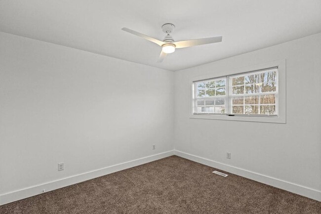 Building Photo - Completely Remodeled 2BR/1.5BA Townhome – City Convenience!