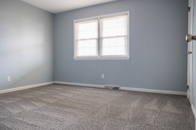 Bedroom one - Coat of Arms Apartments