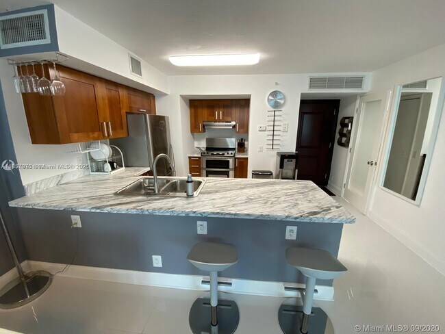 Building Photo - 9499 Collins Ave