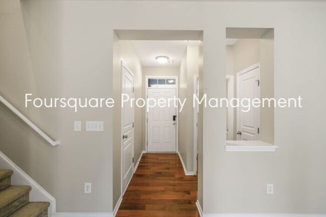 Building Photo - Charming Townhome with Open Layout, Back Patio & One-Car Garage – Near RTP, RDU & Everyday Conven...