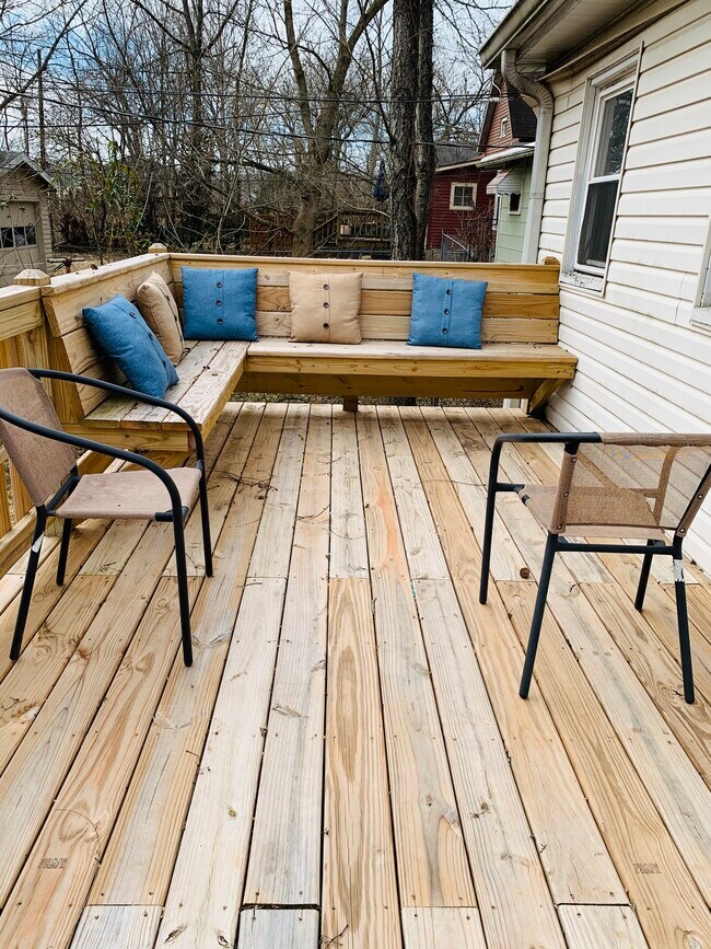 rear deck with built in seating - 210 E Vermilya Ave