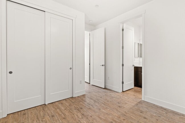 Building Photo - Sun-Filled Corner 4BR w/ Dual Yards & Panoramic Indoor-Outdoor Flow