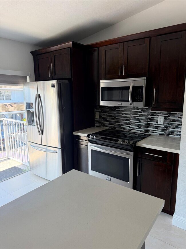 Building Photo - 7040 NW 173rd Dr