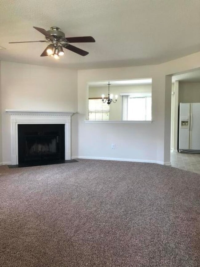 Building Photo - Available now. 4 Bedroom 3 Full Bath Home