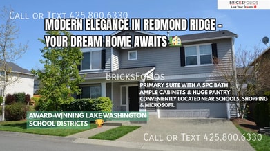 Building Photo - Dream Kitchen, Dual Fireplaces: Find Your Stylish Sanctuary in Redmond Ridge.