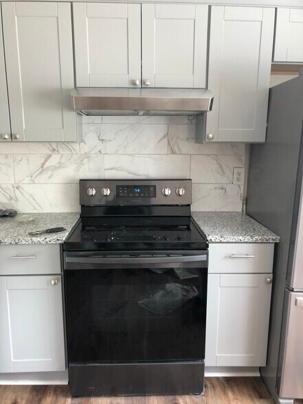Kitchen with Granite, backsplash and all new cabinets - 4424 Logan Way