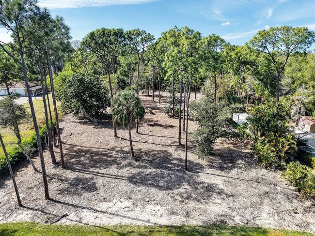 Building Photo - Brand-new contemporary estate on 2.27 private acres