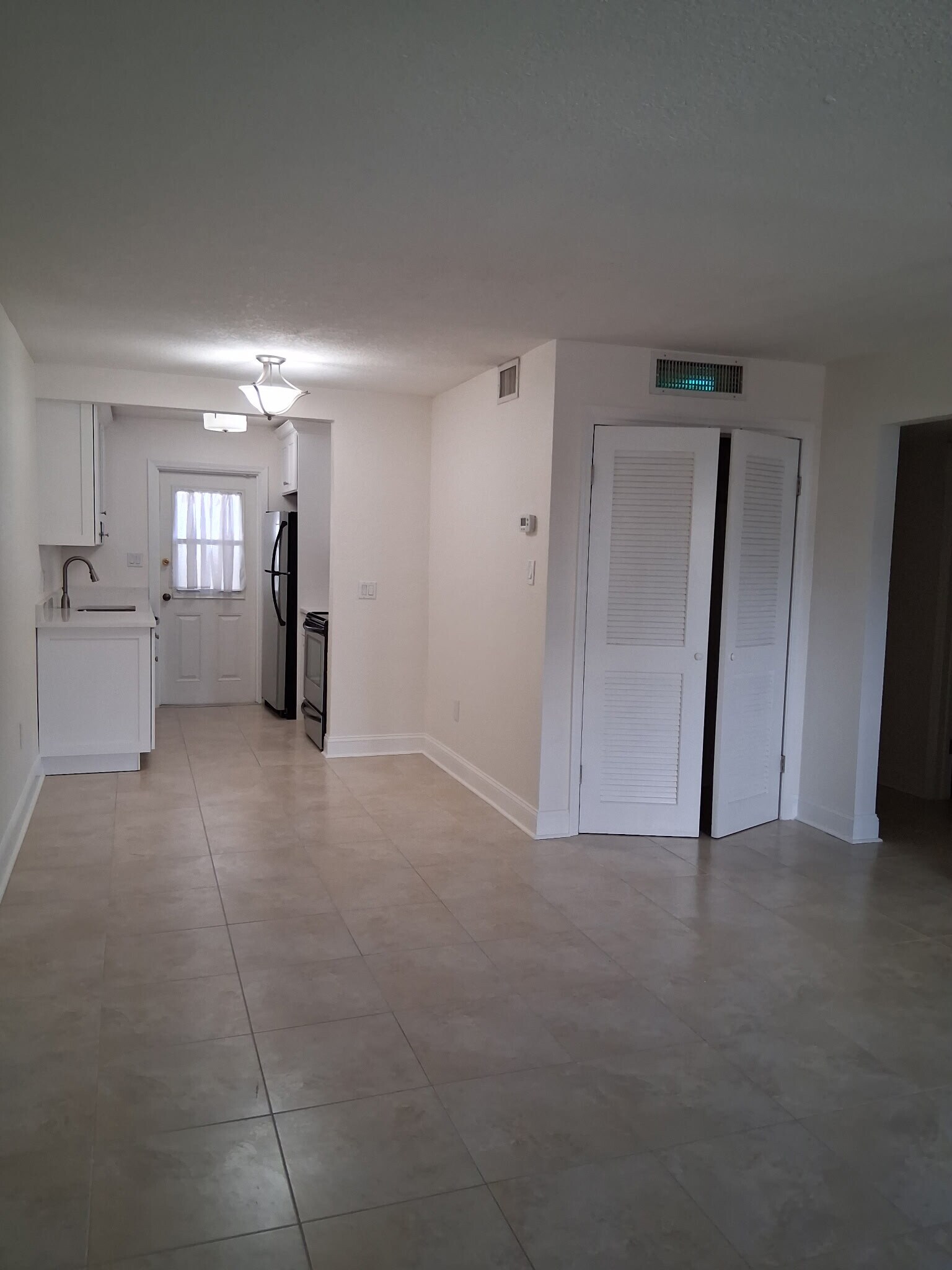 LIVING ROOM TO KITCHEN - 208 Danube Ave