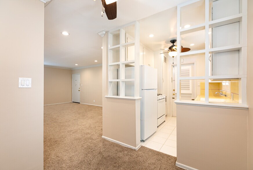 view looking at living room with front door in distance - 1317 19th St