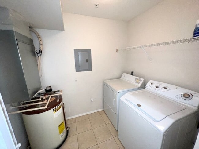 Building Photo - Move in NOW- Spacious 2 bedroom 1 bath condo on 3rd floor in gated community! Water included with...