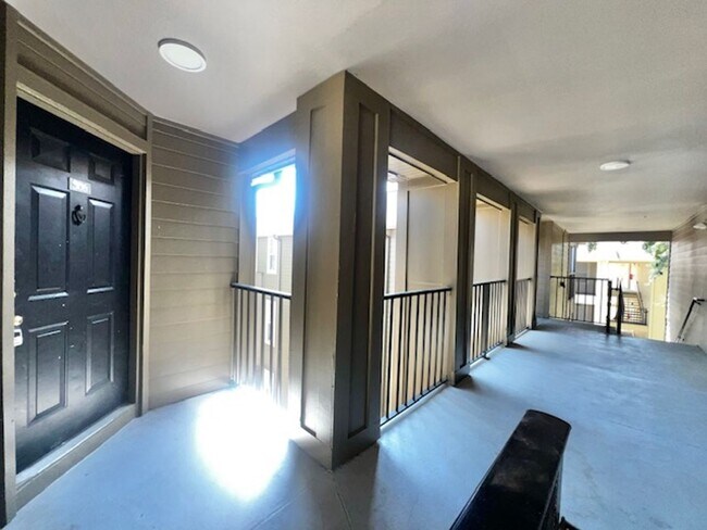 Building Photo - NEW-Remodeled bathroom & kitchen! NEW VINYL PLANK flooring & fresh paint! 2 bedroom 1 bath condo ...