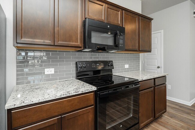 Building Photo - Spacious Townhome Available Now!