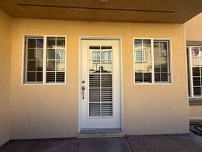 Building Photo - Upgraded Condo with Private Patio, AC, Pool, Gym, and Covered Parking in Gated Community