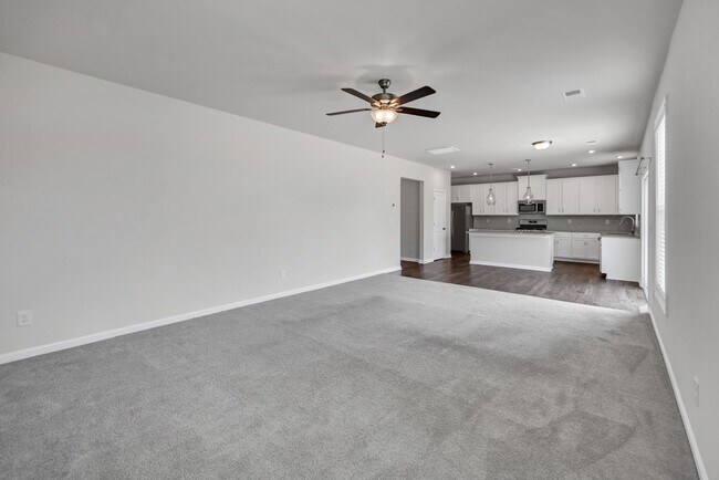 Building Photo - Sophisticated Like-New 4-Bedroom Home with Designer Finishes & Fenced Backyard!