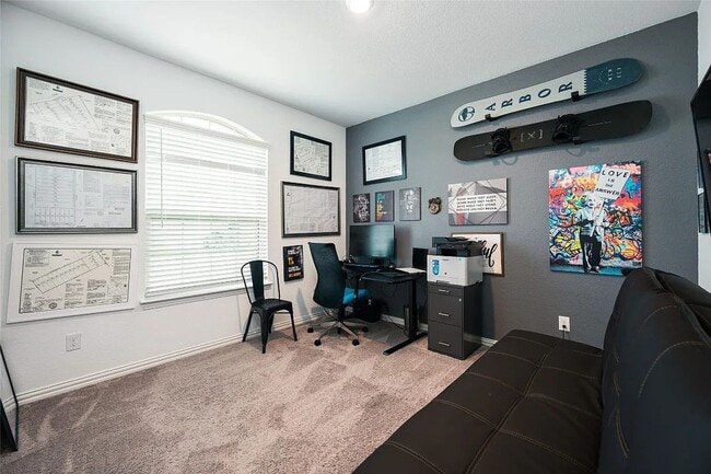 Building Photo - Stylish 4-bedroom home with quartz kitchen, luxury flooring, covered patio, and resort-style amen...