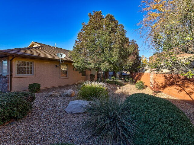 Building Photo - "Charming Fully-Furnished 1-Bed Oasis with Fireplace & Granite Touches in St. George!"