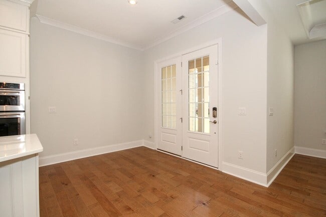 Building Photo - Beautiful John Wieland end unit townhouse ...