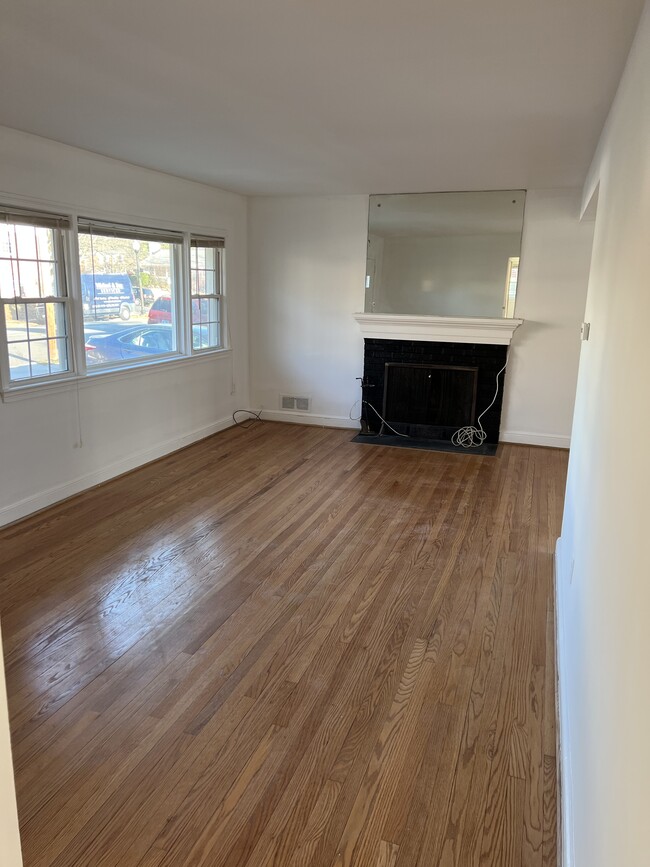 Upstairs Living Room with Fireplace - 1955 N Woodrow St